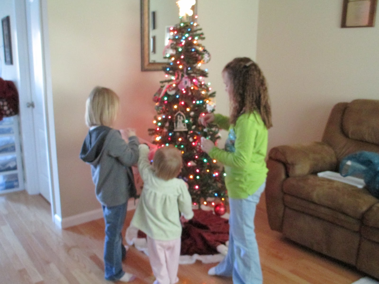 Our Little Family Putting up our Christmas Tree