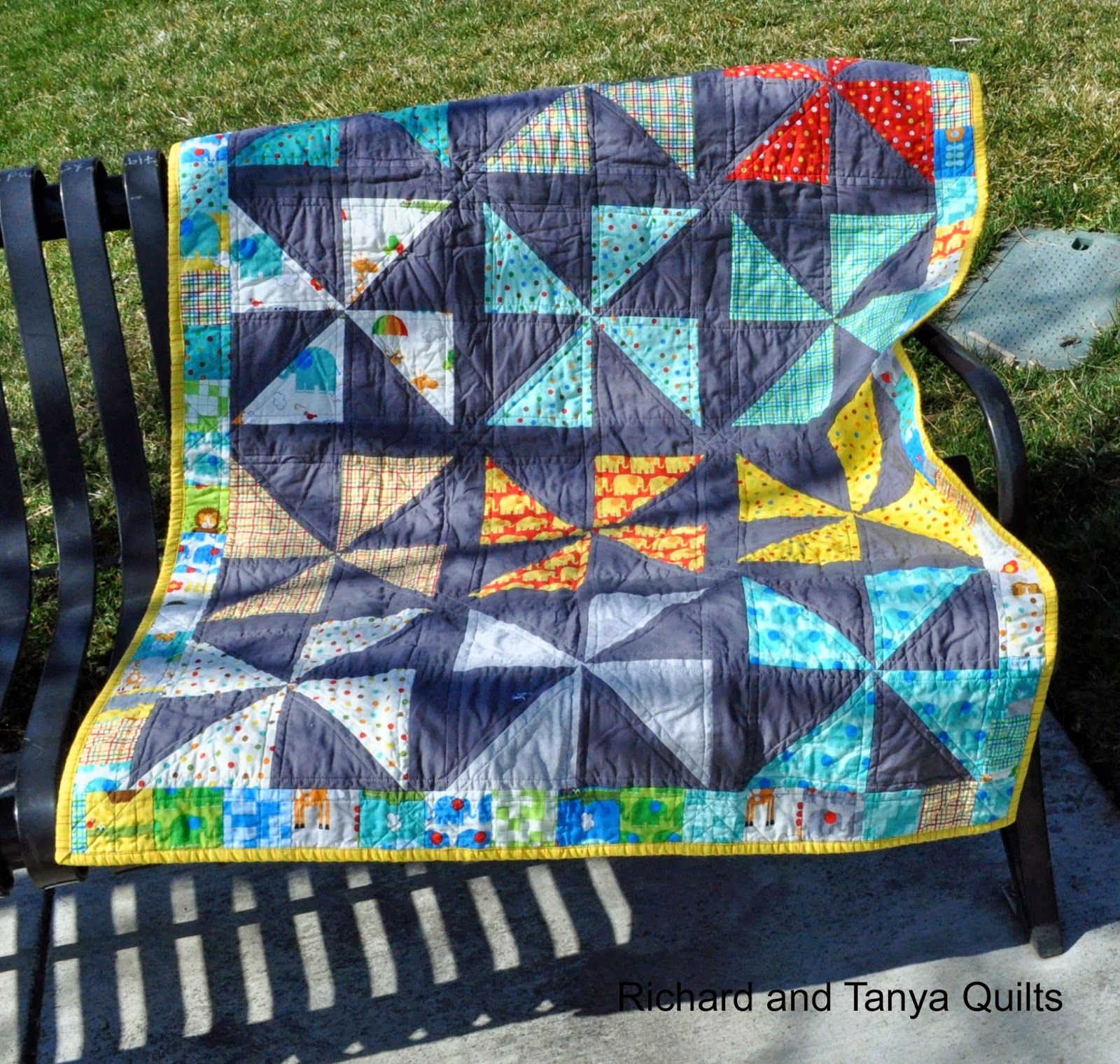 Richard and Tanya Quilts Pinwheel Quilt with Scrappy Border