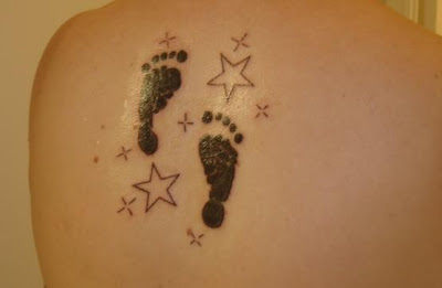 Baby footprint tattoos can be made on any part of the body-They can be inked on the back