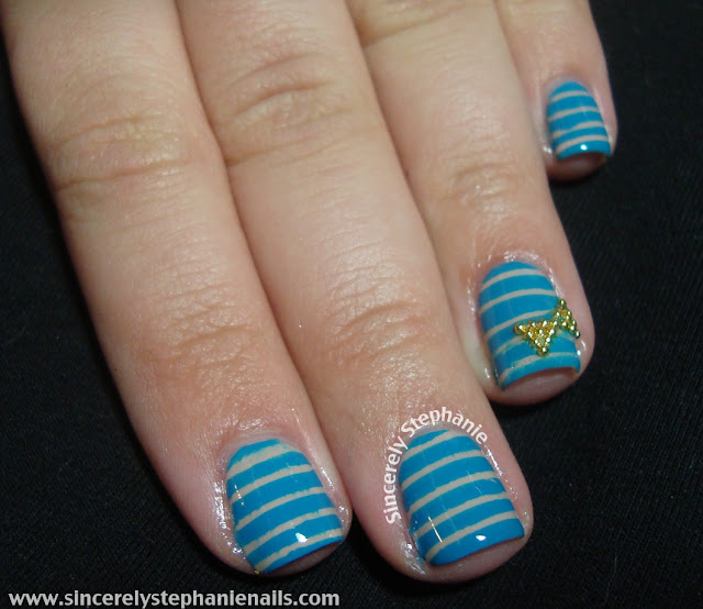 stripe and bow nail art