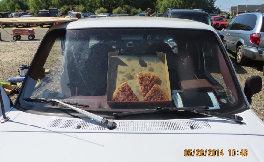 A weird way to warm up left-over pizza at the Hartville Ohio flea market.