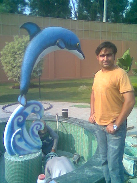 SCULPTURE OF DOLFIN IN EDEN ABAD LAHORE.