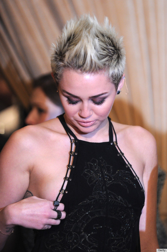 Miley Cyrus Violates Dress Code at PreGrammy Party 2013 (PHOTO