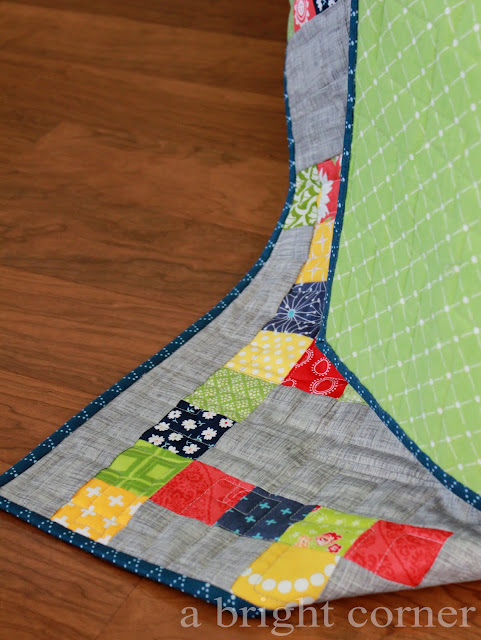 This is a fun, scrappy quilt made with the Mazed quilt pattern