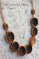 http://www.jewelsofsayuri.com/2013/11/gilded-woods-button-necklace-diy.html