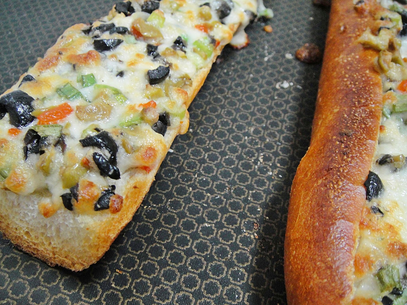 Maryam's Culinary Wonders 713. Cheesy Olive Baguettes