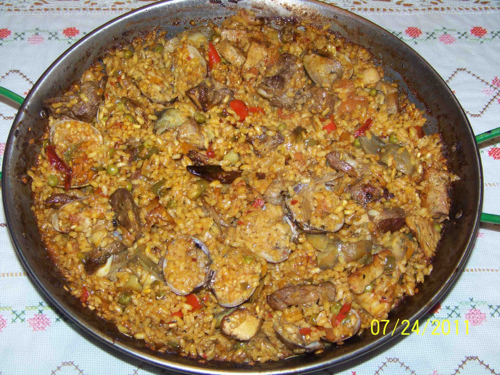 Culinaria y otras cosas Paella con almejas y setas al horno