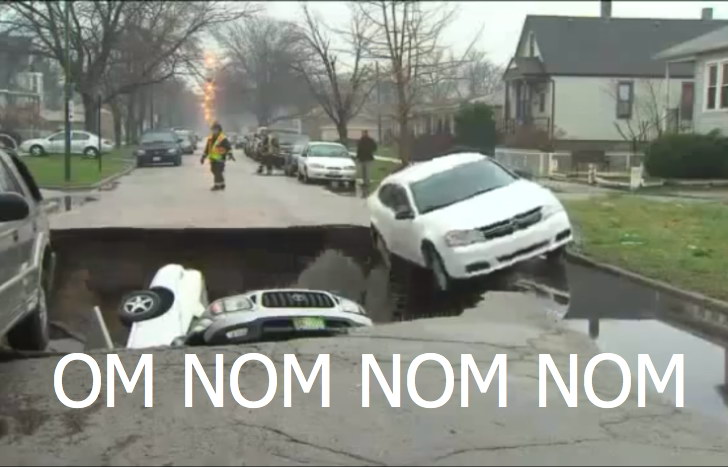 sinkhole-swallow-cars-in-chicago-video.j