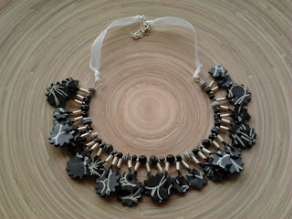 ReJenisis, upcycled cereal box charm tribal necklace in black and white