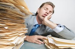 Worker asleep at desk