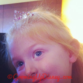 child wearing Disney tiara