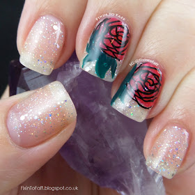 Romantic and sparkly nail art featuring roses and diamond glitter.