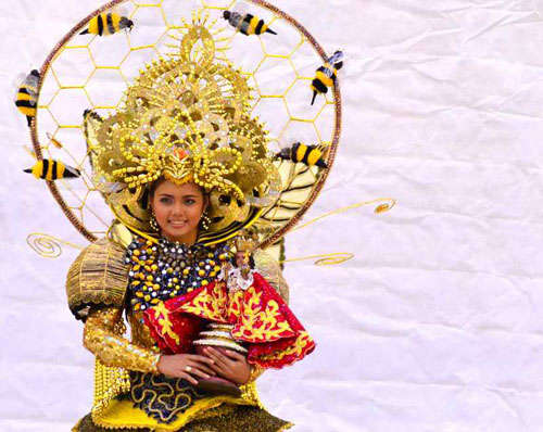  Sinulog Festival of Cebu is one of the most remarkable festivals in the Philippines, this festival is being celebrated in honor to native's patron saint - Santo Niño. Sinulog means graceful dancing comes the beautiful lady in the famous colorful and delicately crafted wears, together with the dancers colorfull costume. Photos of glam, pageantry and pomp.