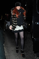 Lindsay Lohan wearing very short black skirt