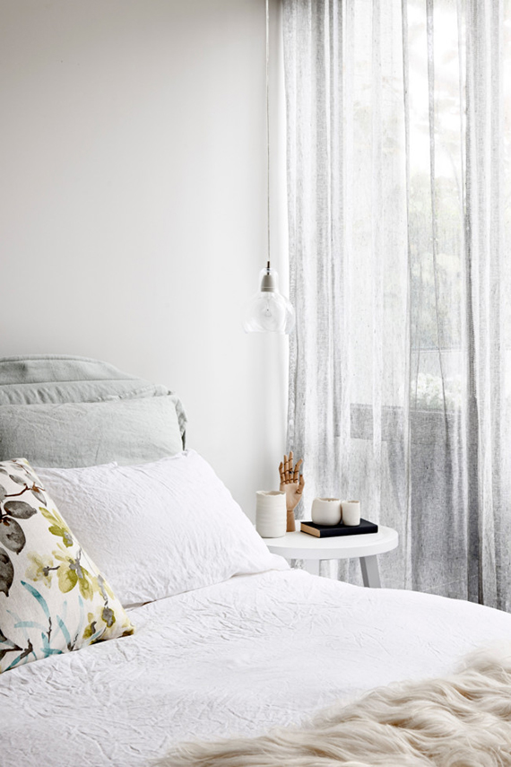 Bare bulb pendant lamps as bedside lighting | Image by Eve Wilson via Vogue Living Australia