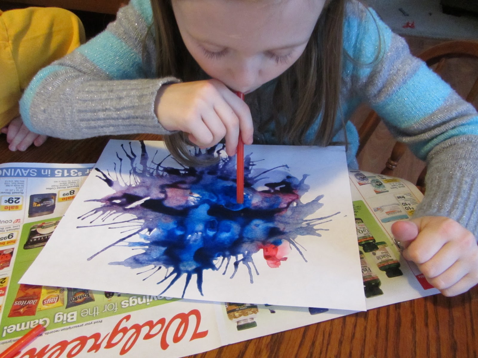 The Unlikely Homeschool Blow Painting