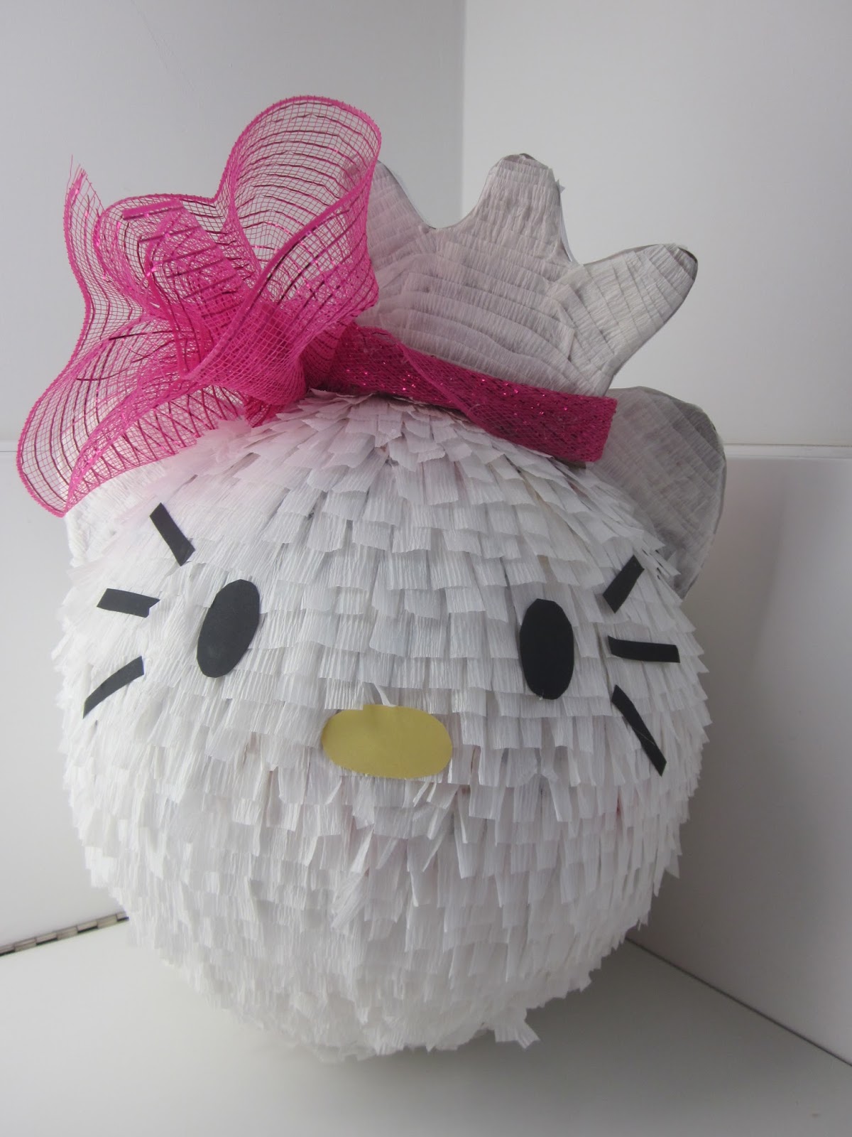 Kitty Pinata in Her Full Regalia and a Flower Craft | The Hard Way
