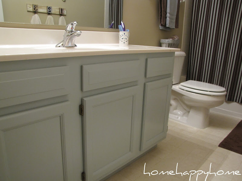 Painting oak cabinets is such an easy fix and makes a huge difference. title=