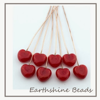 https://www.etsy.com/uk/listing/174196370/pair-of-handmade-lampwork-glass-red?ref=shop_home_active