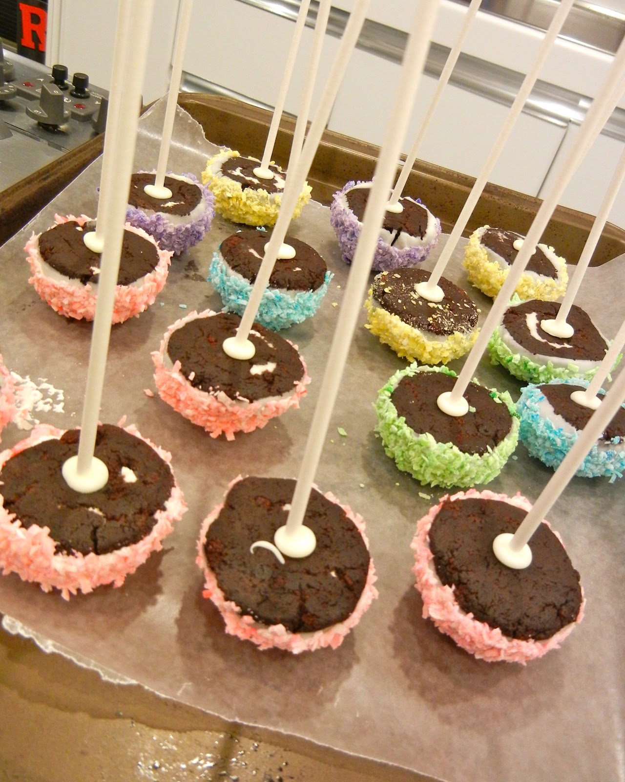 Sugar Swings! Serve Some mini hostess sno ball cake pops.....!