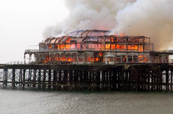 Arcade Fire band name origin - Brighton pier burning How did Arcade Fire get the band name idea - Brighton pier burning