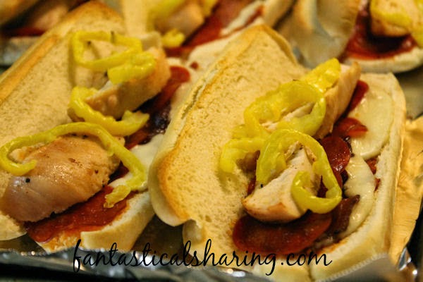Loaded Chicken Italian Subs | Subs featuring pepperoni, bacon, chicken, Provolone, and banana peppers #recipe #sandwich