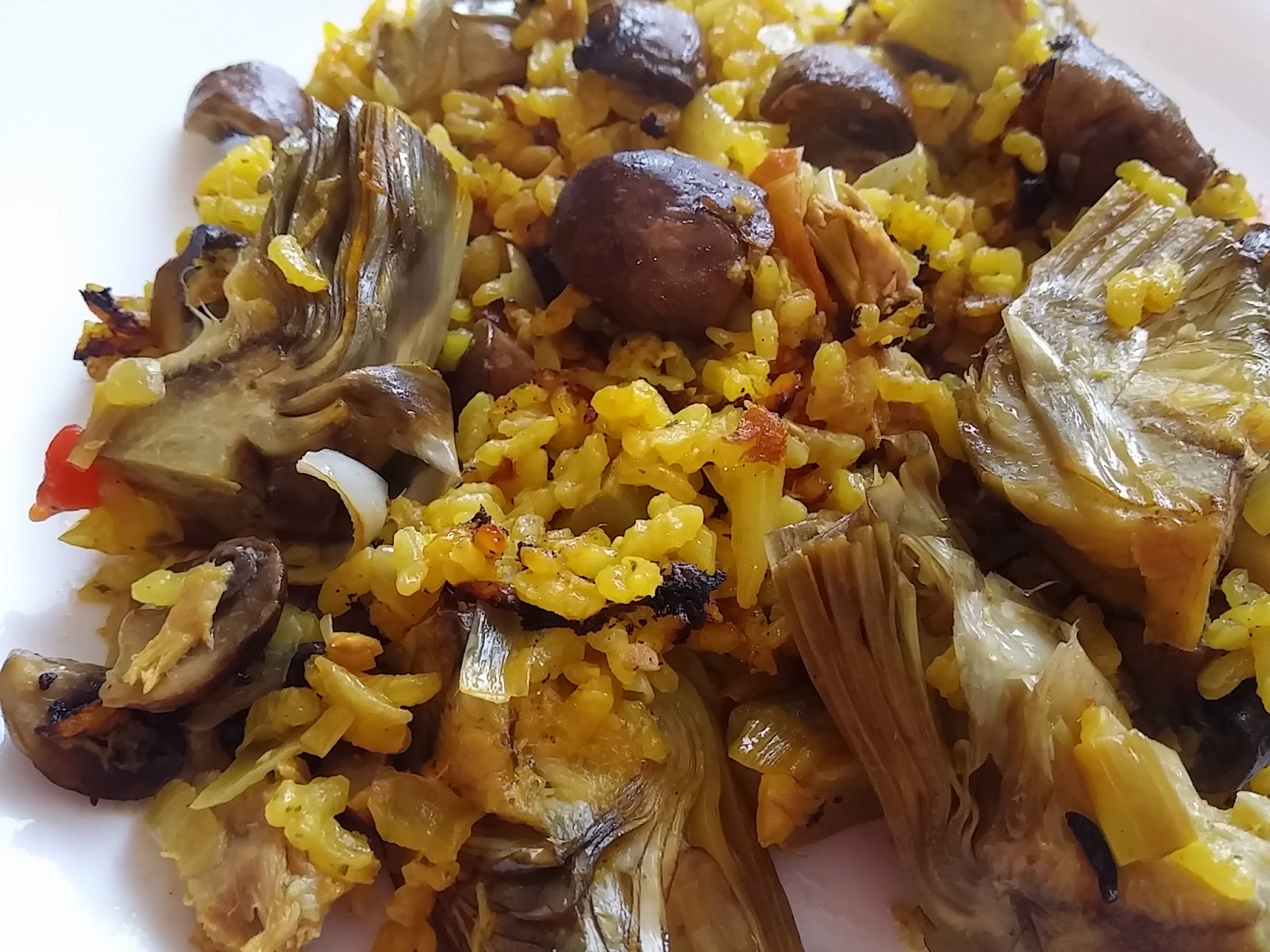 Las Recetas De Mi Cocina Alcachofas y portobello en paella.