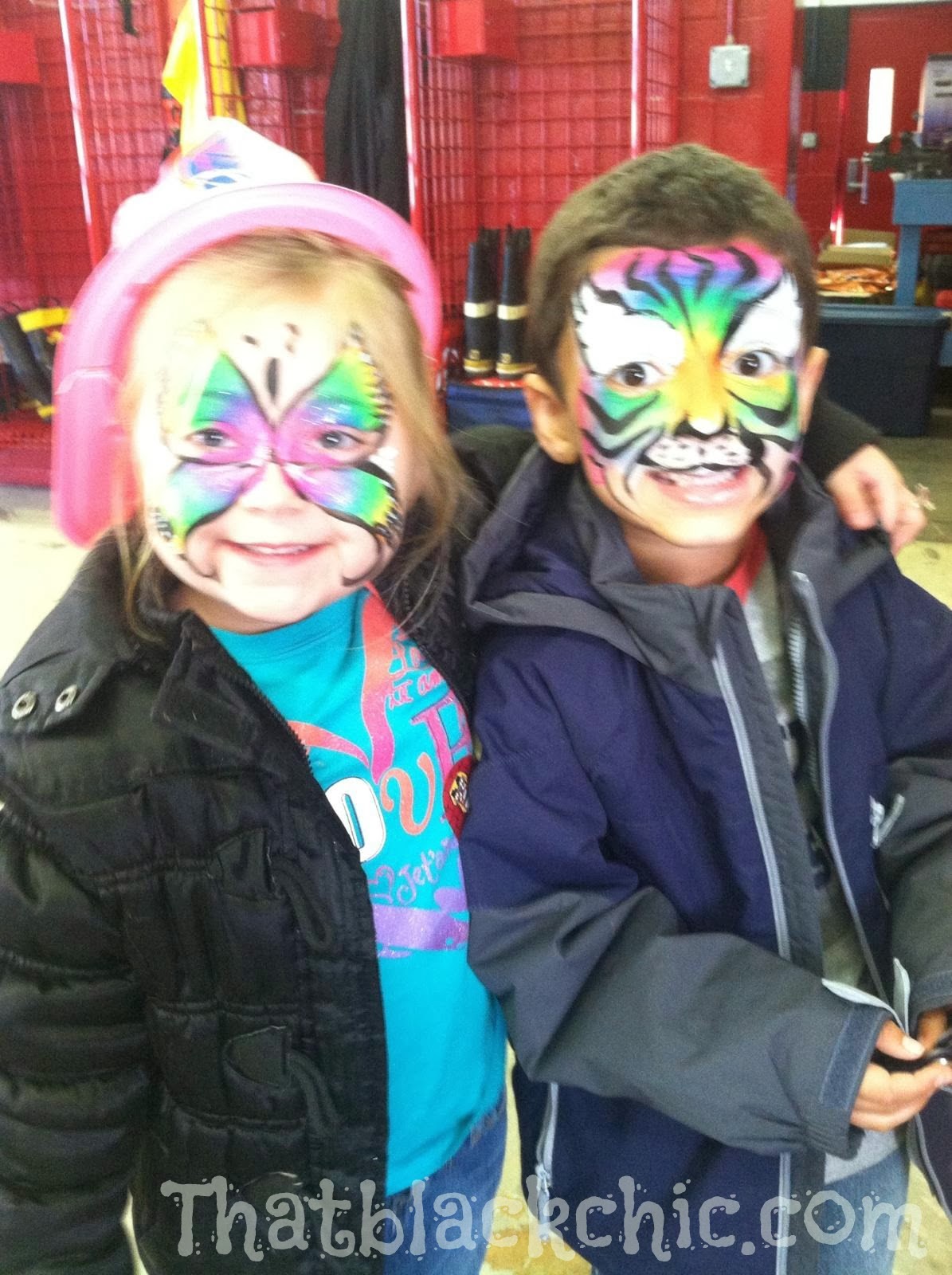 Giving back by volunteering Face Painting the kiddies That Black Chic