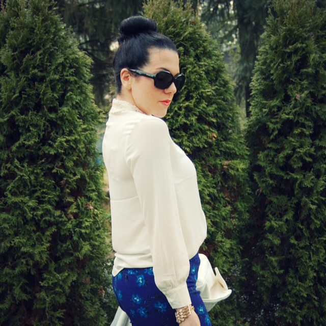 Winter white wool coat with Gap floral pants and a Marc Jacobs handbag