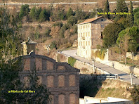 La Fàbrica de Cal Riera amb la Torre de l'Amo al seu darrere La Fàbrica de Cal Riera amb la Torre de l'Amo al seu darrere