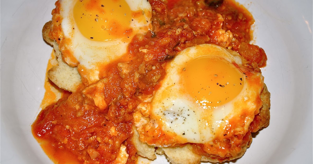 Mister Meatball Eggs poached in Red Sauce