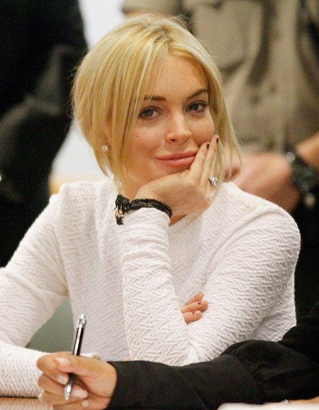 hot celebrity pics photos celebrity news lindsay lohan necklace case sitting in the courthouse