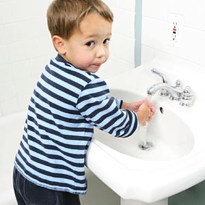 child wash hands
