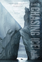 Chasing Ice poster with two massive icebergs colliding, a tiny boat between them