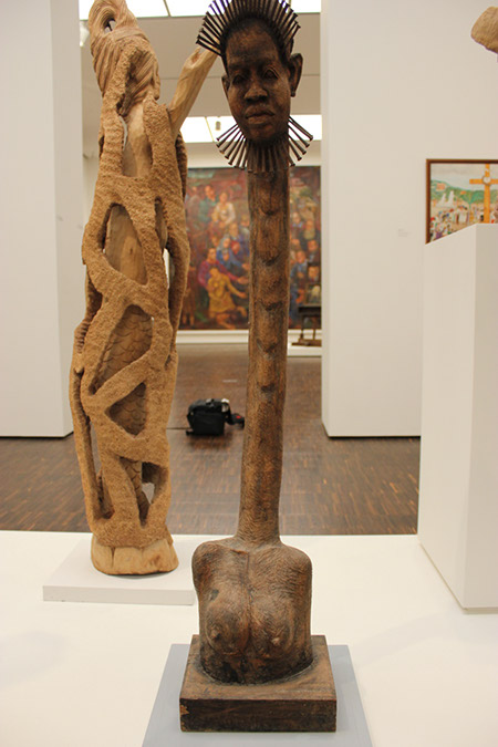 African Art Exaggerated Human form. Artist: Acius Joseph. Photograph of African Art wood carvings with exaggerated extended body and neck. See my article the Picasso Effect to compare Picasso's fascination with the same use of exaggerated form.
