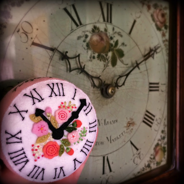 antique clock face pincushion