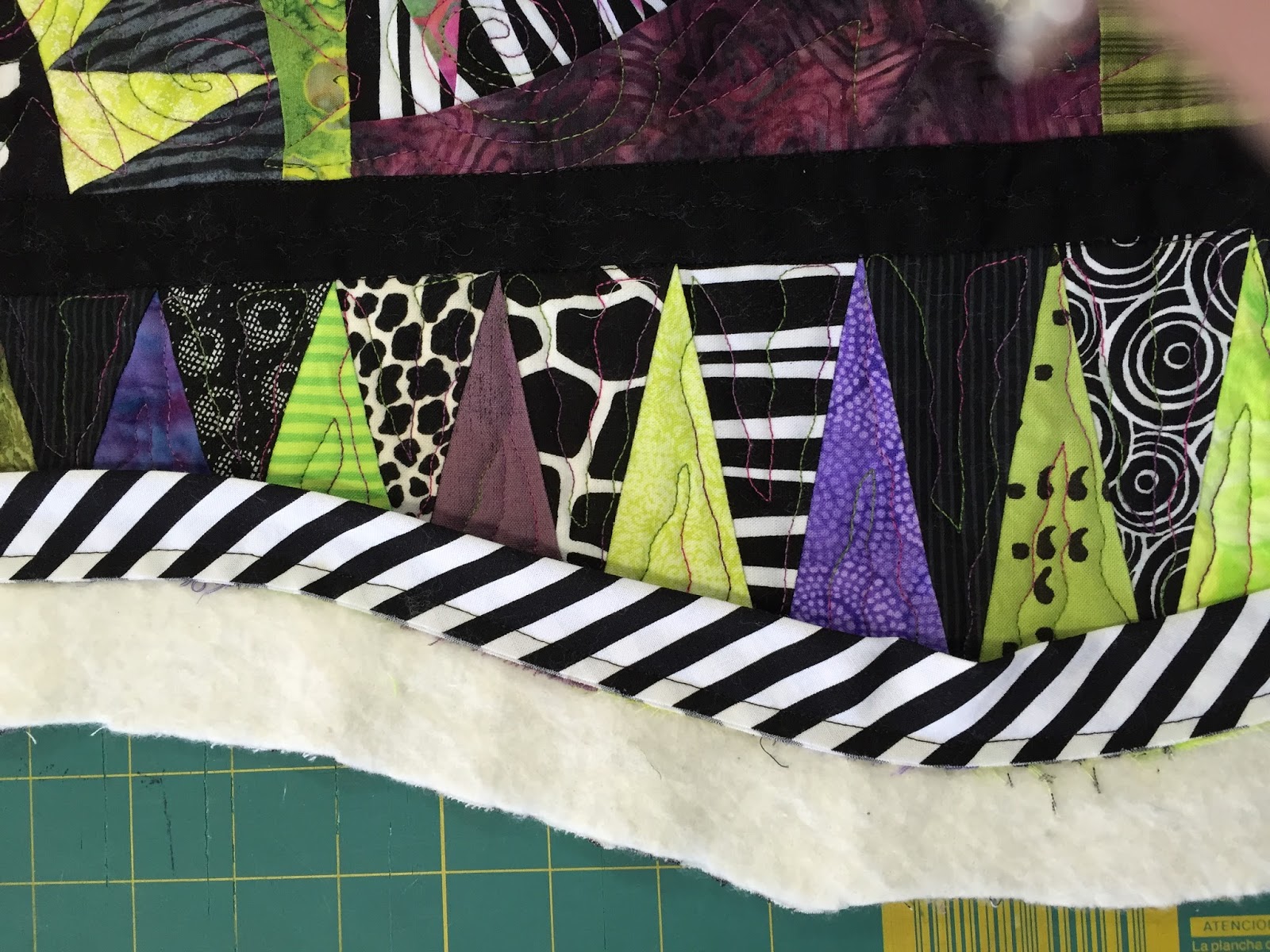 She Quilts It Binding on curved edged quilts