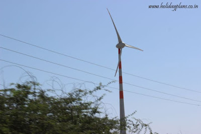 Windmill right on the road Windmill right on the road