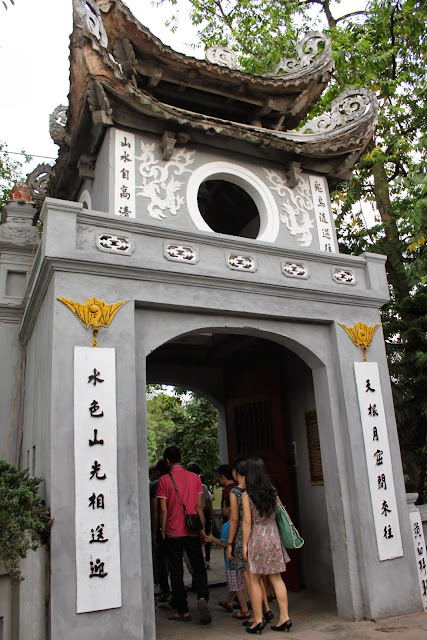 The rear of the tower view of Ngoc Son Temple as you pass through the main entrance at Hoan Kiem Sword Lake in Hanoi, Vietnam The rear of the tower view of Ngoc Son Temple as you pass through the main entrance at Hoan Kiem Sword Lake in Hanoi, Vietnam
