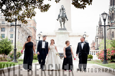Bridal Party walking in Mt. Vernon Square Baltimore