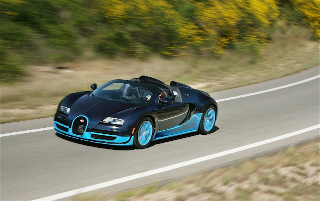 2013 Bugatti Veyron Grand Sport Vitesse front three quarter in motion 2013 Bugatti Veyron Grand Sport Vitesse front three quarter in motion