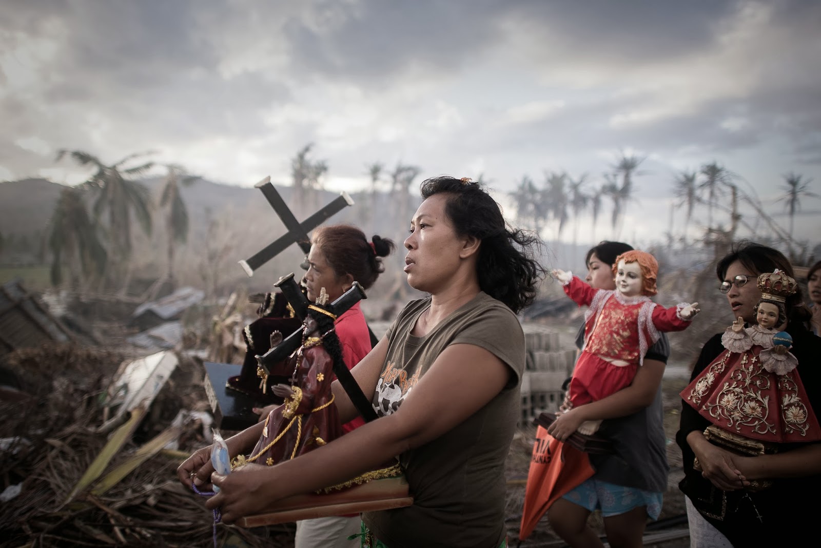 1st Prize Spot News Single Phillipe Lopez, France, Agence France-Presse 18 November 2013, Tolosa, the Philippines Survivors of typhoon Haiyan march during a religious procession in Tolosa, on the eastern island of Leyte. One of the strongest cyclones ever recorded, Haiyan left 8,000 people dead and missing and more than four million homeless after it hit the central Philippines. World Press Photo, Philiipe Lopez