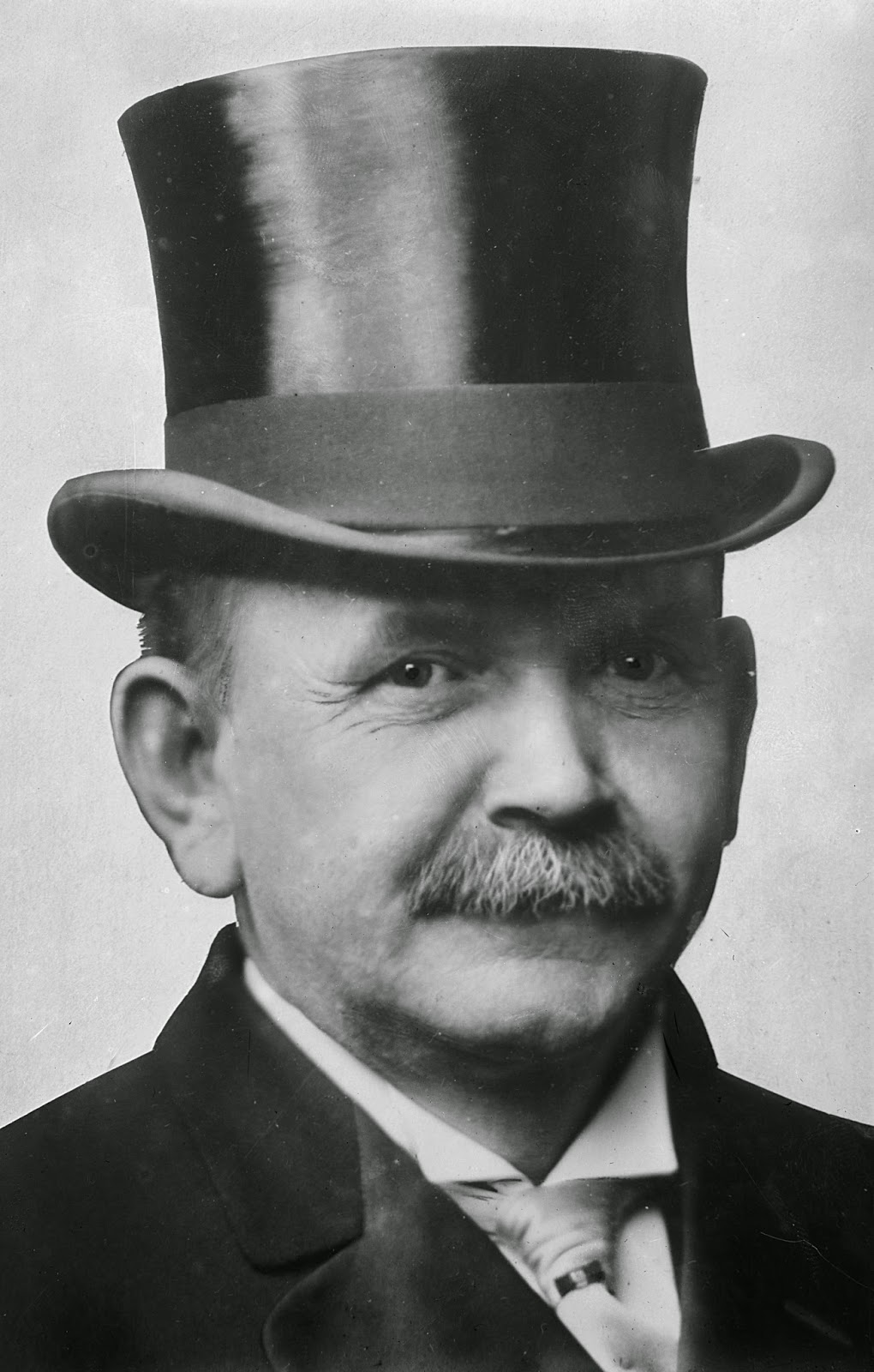 man with top hat and moustache