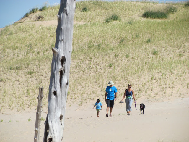 Family hike up Dune at Ghost Forest, Sleeping Bear Dunes Family hike up Dune at Ghost Forest, Sleeping Bear Dunes (photo by J. Schechter)