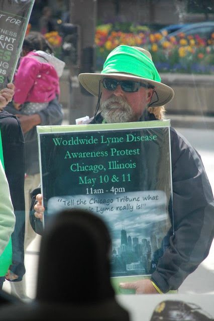 Dave holds up his sign.