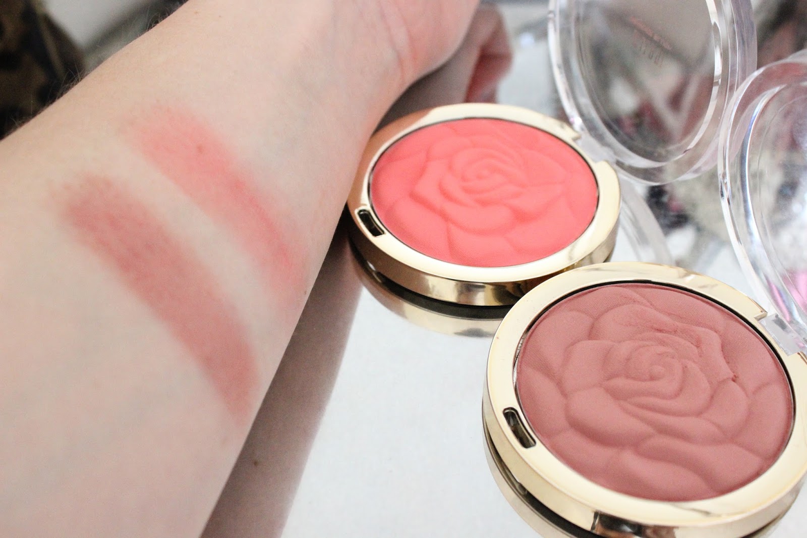 Milani Rose Powder Blush a little pop of coral.