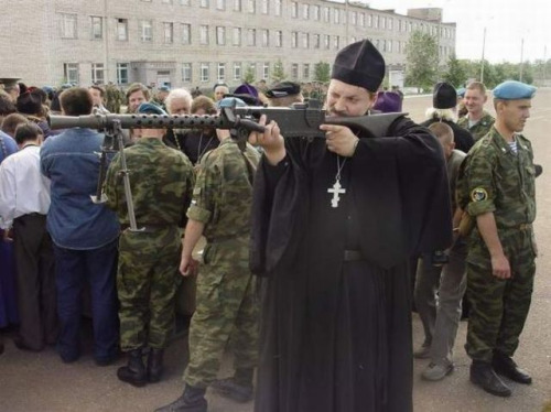 Image result for priest with rifle