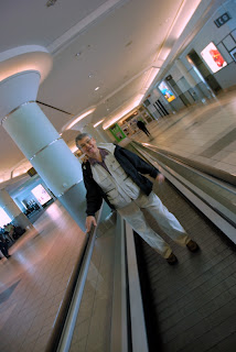 Grandfather has a love for moving sidewalks, while Grandmother opts to walk beside us.