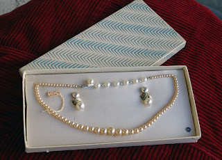 http://www.ebay.com/itm/Formal-White-Faux-Pearl-Necklace-Matching-Earring-Vintage-costume-jewelry-/281701188676?pt=LH_DefaultDomain_0&hash=item4196b30444