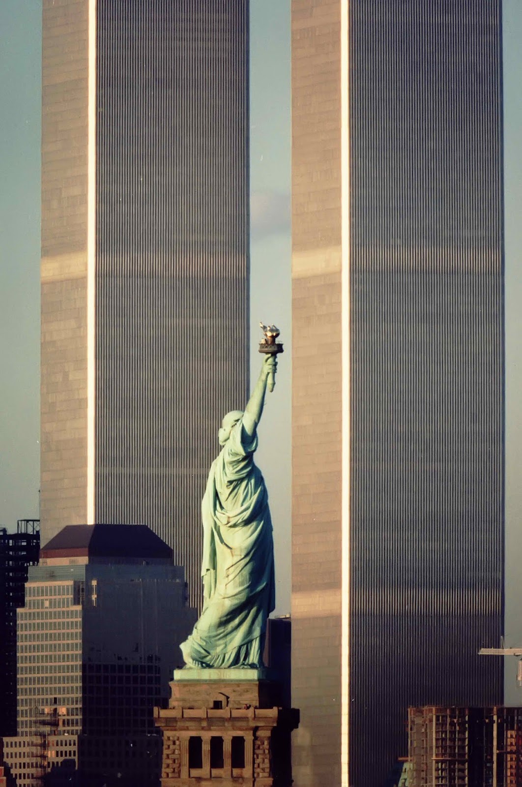 The Statue of Liberty, flanked by the twin towers of the World Trade Center, New York, USA, 1983